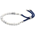 Polsera de fil vermell amb Howlita blanca - Xacres